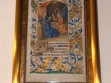 framed picture of a painting of a woman and a man sitting on a bench