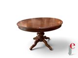 an image of a round table with a wooden base and a wooden top
