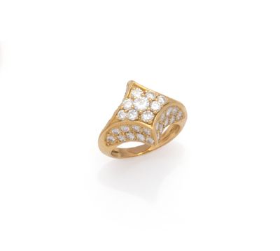 an 18k gold and diamond ring