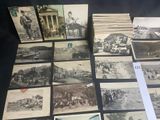 many old black and white photographs on display in a glass case