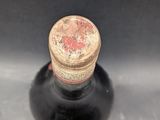 a bottle of wine with a cork stopper on it