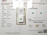 un certificat sur lequel figure l'image d'une émeraude verte