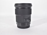 the lens is sitting on a white surface and ready to be used
