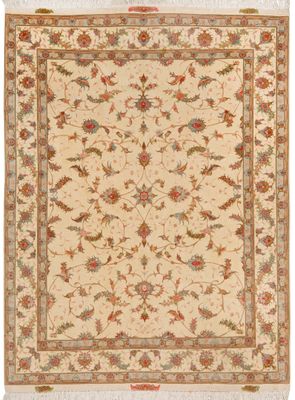 a beige rug with a floral design on it