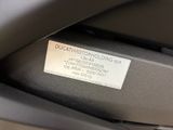 a close up of a label on the back of a motorcycle