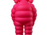 an image of a pink inflatable figure standing on a white surface