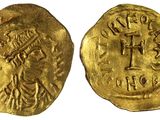 une pièce d'or portant l'image d'un homme