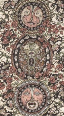 a close up of a rug with many different faces on it