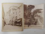 two old black and white photos of people walking down a street