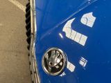 a close up of a blue car with a number 2 on it