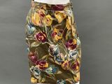 an image of a mannequin wearing a skirt with flowers on it