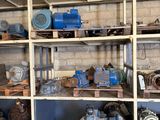 many different types of machinery on the shelves in the warehouse