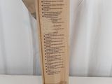 a cardboard box with a list on it on a table