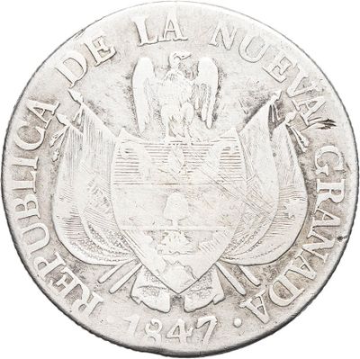 an old silver coin with a coat of arms on it