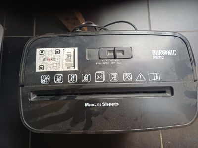 a toaster that is sitting on a tiled floor