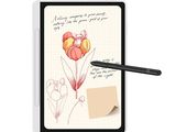 un bloc-notes avec le dessin d'une fleur et un stylo