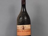a bottle of wine that is sitting on a table