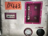 a machine that has a clock on the side of it