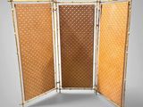 an image of a three panel bamboo screen with a woven design