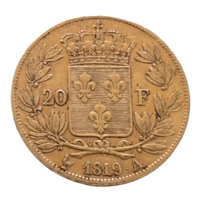 gros plan d'une pièce de monnaie surmontée d'une couronne