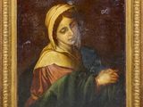 un tableau représentant une femme tenant un oiseau dans la main