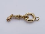 an image of a gold plated metal clasp with a hook