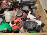 a wooden box filled with different types of power tools