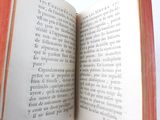 an open book that is sitting on a table