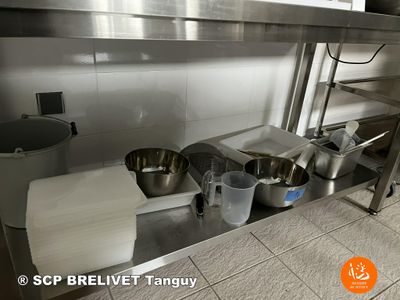 many pots and pans on the counter in the kitchen