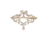 une broche en or et diamants
