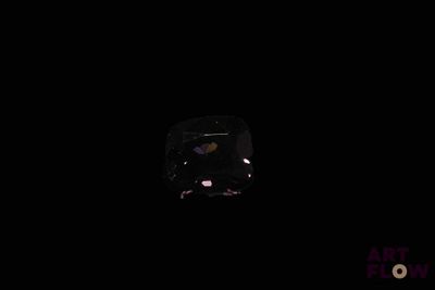an image of a black diamond in the dark