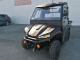 an image of a black utility vehicle parked in front of a building