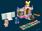 a lego castle with a lot of toys on the table