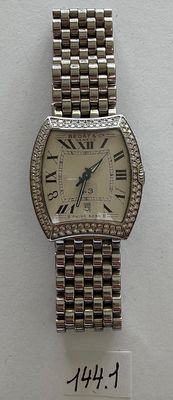 an image of a wrist watch on display with a price tag