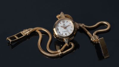 OMEGA, Ladymatic, Montre de dame et son bracelet en or jaune…