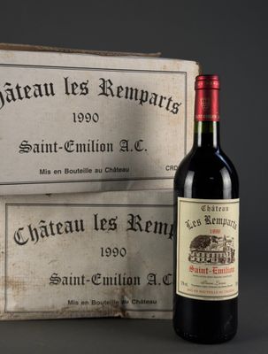 a bottle of wine sitting next to a box of wine