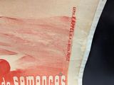 a red and white advertisement on a piece of paper