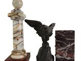 marble angel figurines with marble bookends on a white background