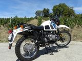 a motorcycle that is parked on the side of the road