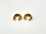 a pair of gold hoop earrings on a white background