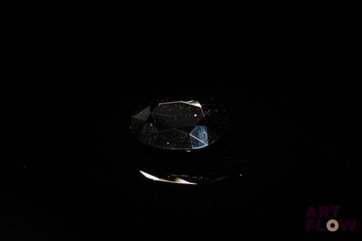 an image of a diamond on a black surface