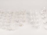 a lot of empty wine glasses sitting on a table