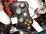 a pile of video game controllers sitting on top of each other