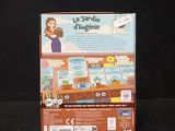 a box with a game inside of it on a black surface