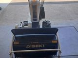 a small machine that is sitting in the garage