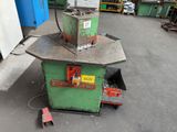 a machine that is sitting on a table in a warehouse