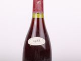 a bottle of wine that is sitting on a table
