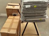 a stack of boxes sitting on a pallet in a warehouse
