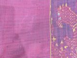 a red cloth with a picture of a horse on it