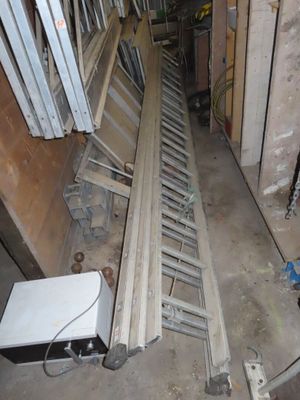 a picture of a room that has a ladder in it